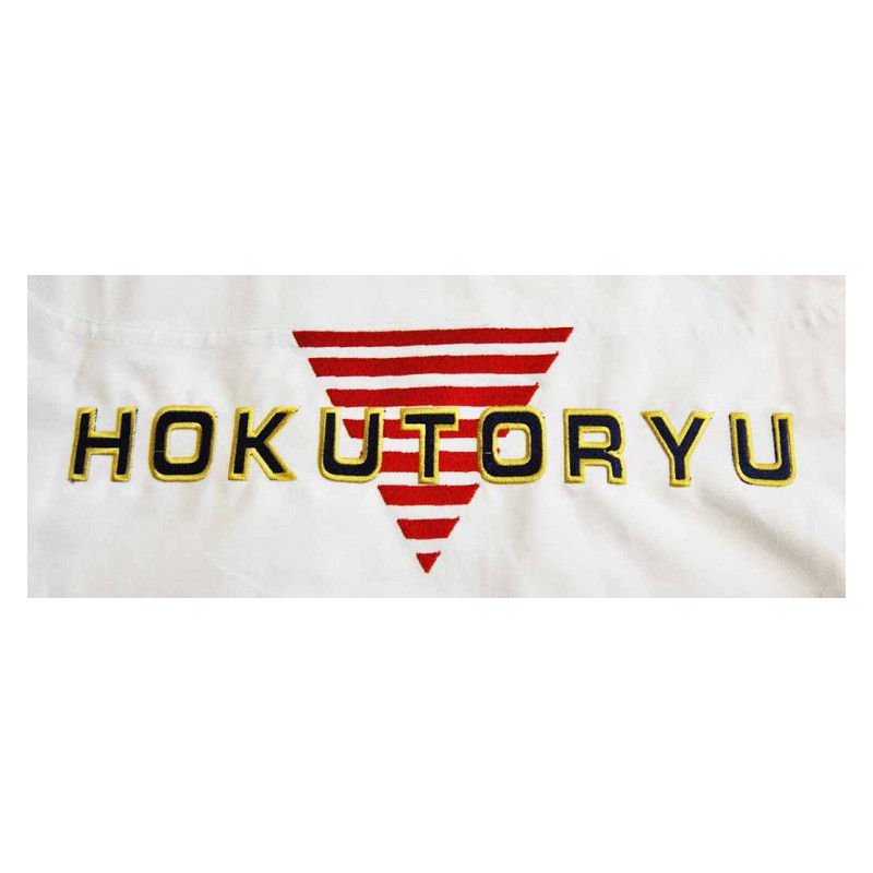 Broderiarbete Hokutoryu ryggmärke